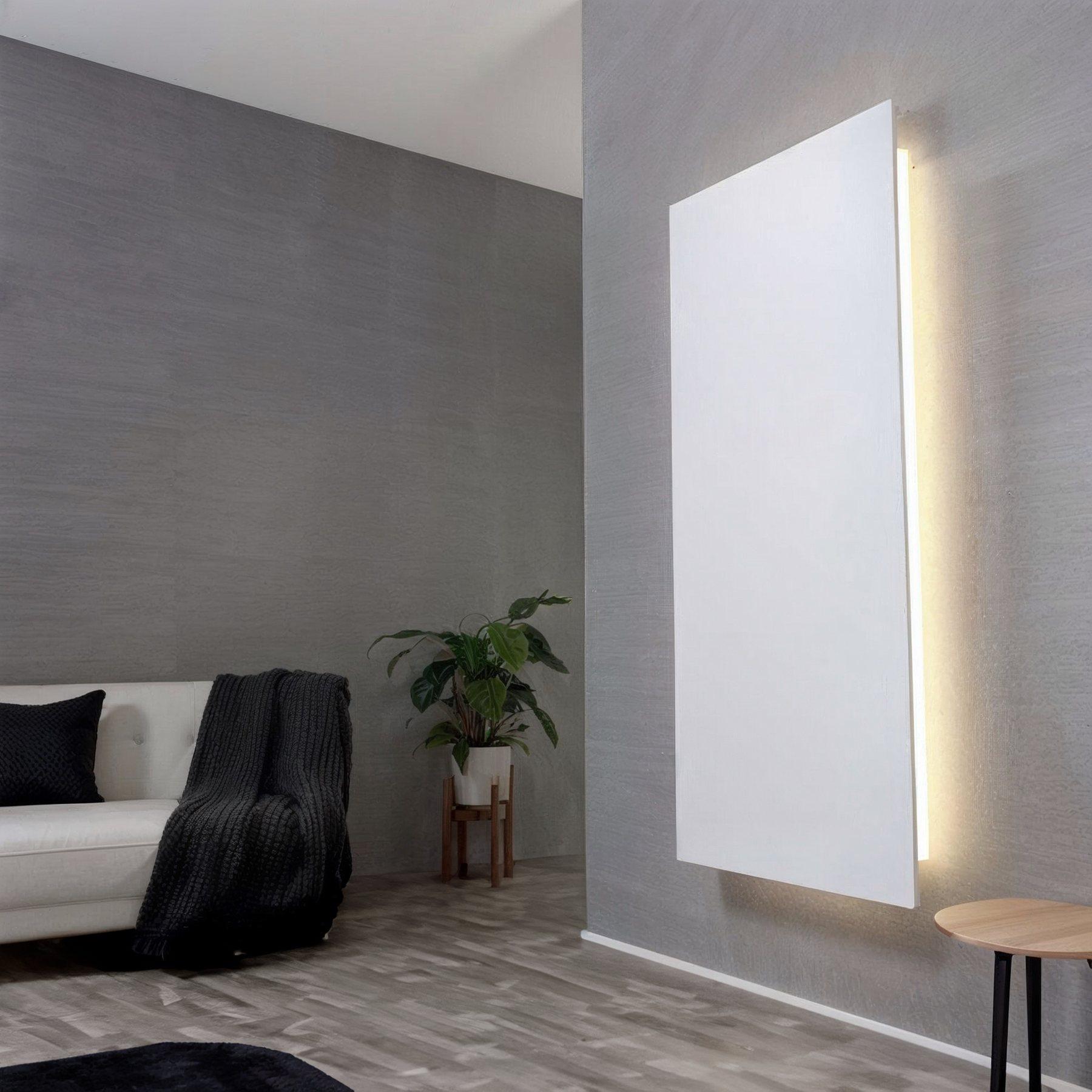 Atmosphere mounted on a living room wall, a warm light line running down its edge